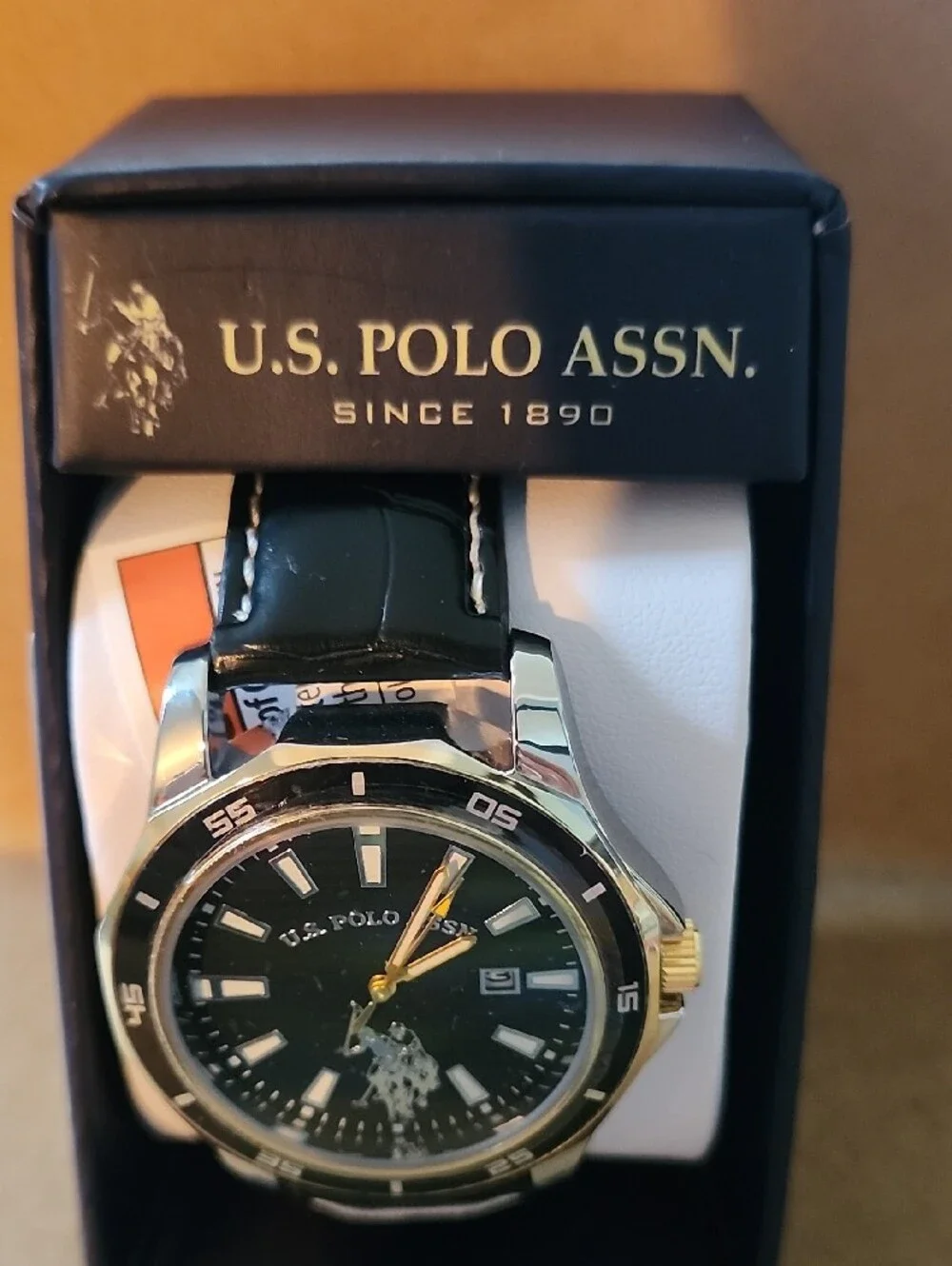 U.S. Polo Assn. Black Dial Watch with Black Leather Strap and Gold Accents